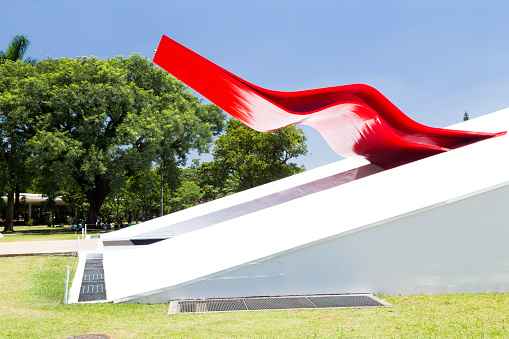 Sao Paulo, Brazil - February 2, 2014: The Ibirapuera Auditorium (Portuguese: Auditório Ibirapuera) is a building conceived by Oscar Niemeyer for the presentation of musical spectacles, situated in Ibirapuera Park in São Paulo.