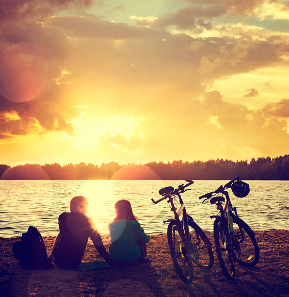 istock Romantic Couple with Bikes by the Lake 483582660