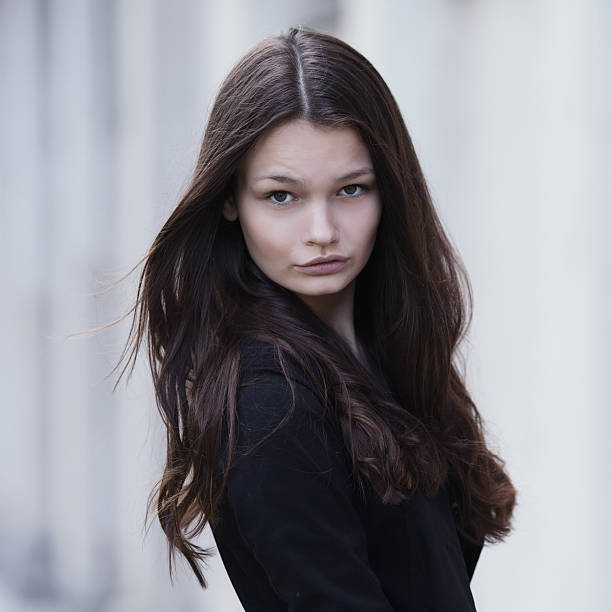 istock beautiful serious girl portrait 483583398
