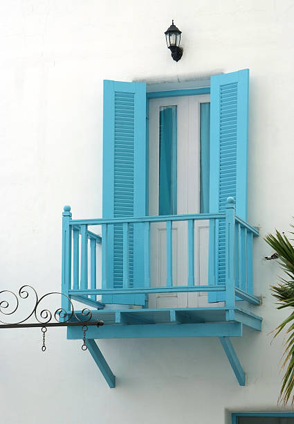 istock blue door and terrace on the white wall 483583539