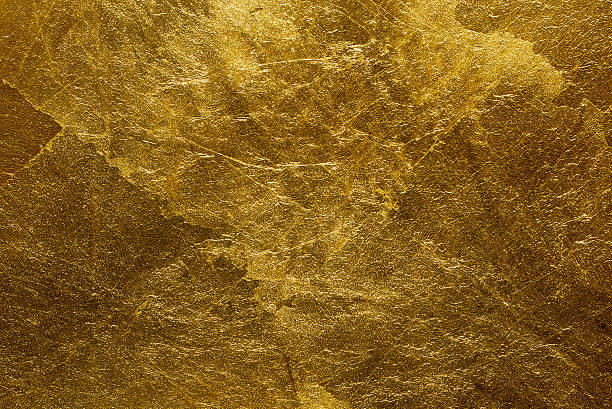 gold wall Gold painted stone wall texture. gold metal stock pictures, royalty-free photos & images
