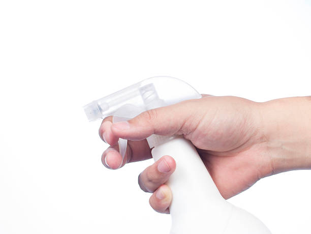 istock Spraying a cloth with laundry detergent in spray bottle 483587003