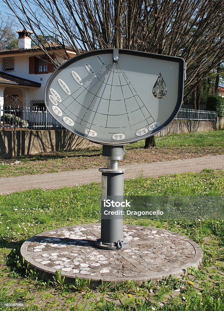 Height Sundial in Aiello The Height Sundial (or Orologio Solare d'Altezza) in Piazza Donatori di Sangue in Aiello del Friuli, Italy. This 2 metre high, 1.25 metre wide 2006 sundial is made of iron with a glass frame Friuli-Venezia Giulia Stock Photo