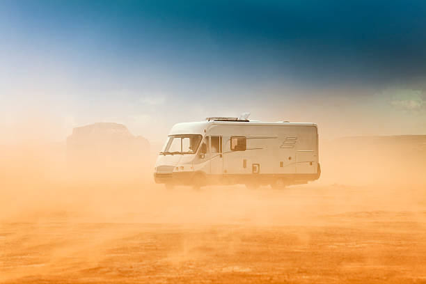 istock Camper in a sandstorm at Monument Valley 483589787