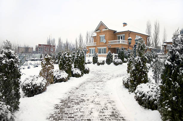 House and yard in wintertime in the country.