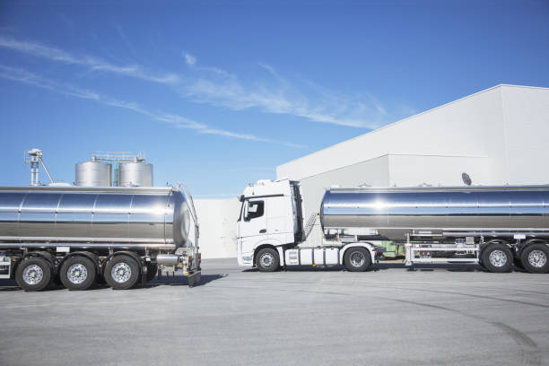 istock Stainless steel milk tankers parked 483596627