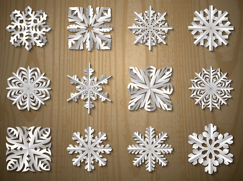 vector christmas paper snowflake set on wood textured background 