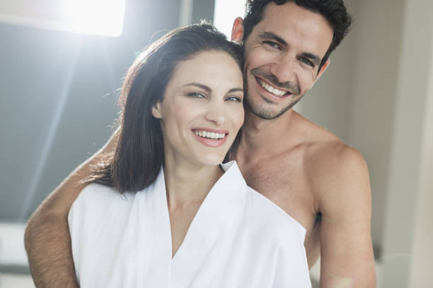 istock Portrait of happy couple hugging 483599237