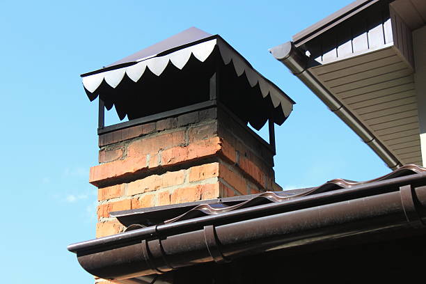 istock Closeup brick chimney on the roof 483603292