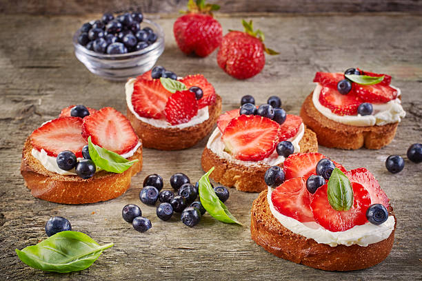 istock toasted bread with cream cheese and berries 483603822