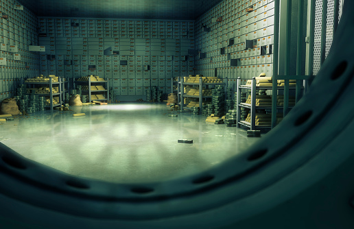 Bank vaulted door with safety deposit boxes.