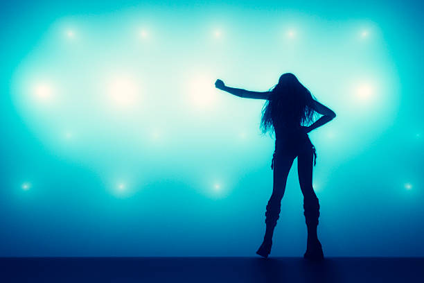 istock Female singer on the stage 483608396