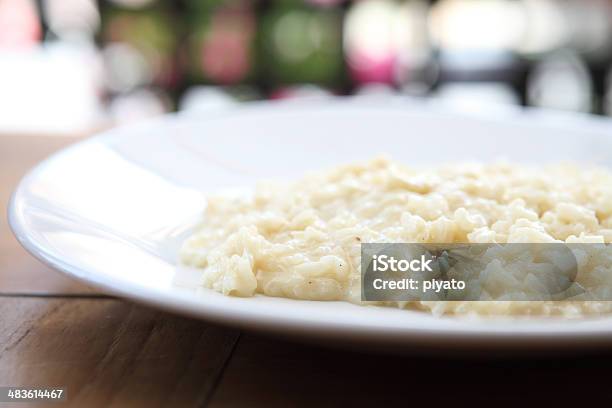 Risotto Dish With Herbs On Wood Background Stock Photo - Download Image Now - Arborio Rice, Basil, Chard