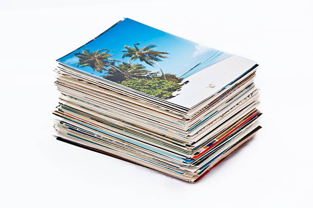 Stack of holiday-postcards A stack of postcards. Card on top is on maldives. XXL size image. postcard photos stock pictures, royalty-free photos & images