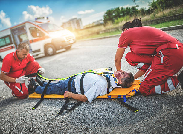 istock rescue team helping injured man 483615463