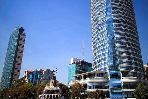 Mexico City, Mexico -  February 2, 2013: Torre Mayor and the St Regis hotel, both are located in the iconic Paseo de la Reforma avenue.