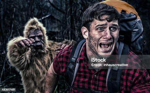 Bigfoot Chasing A Camper Thru The Woods Stock Photo - Download Image Now - Fear, Running, Terrified