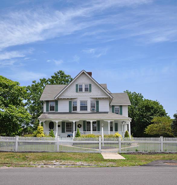 istock Suburban Home White Picket Fence 483617507