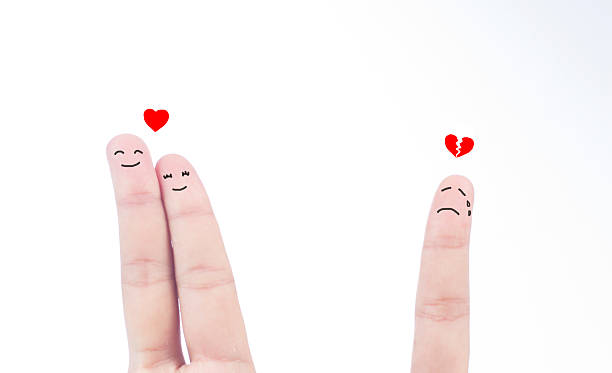 istock Broken heart concept painted on human fingers 483617875