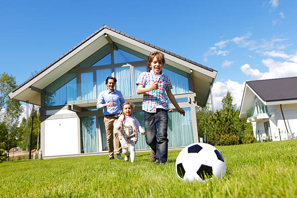istock family playing football 483619352