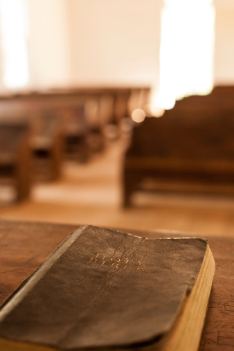 A Bible lying on the pulpit in a church.  Cades Cove, Great Smoky Mountains National Park, TN, USA.