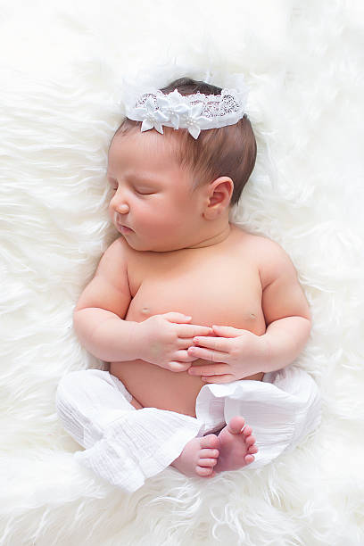 istock Newborn girl sleeping 483620725