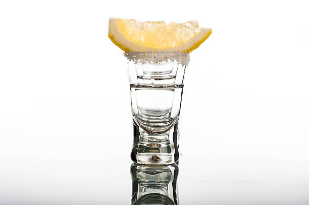 istock Four shots of vodka with lemon 483625564