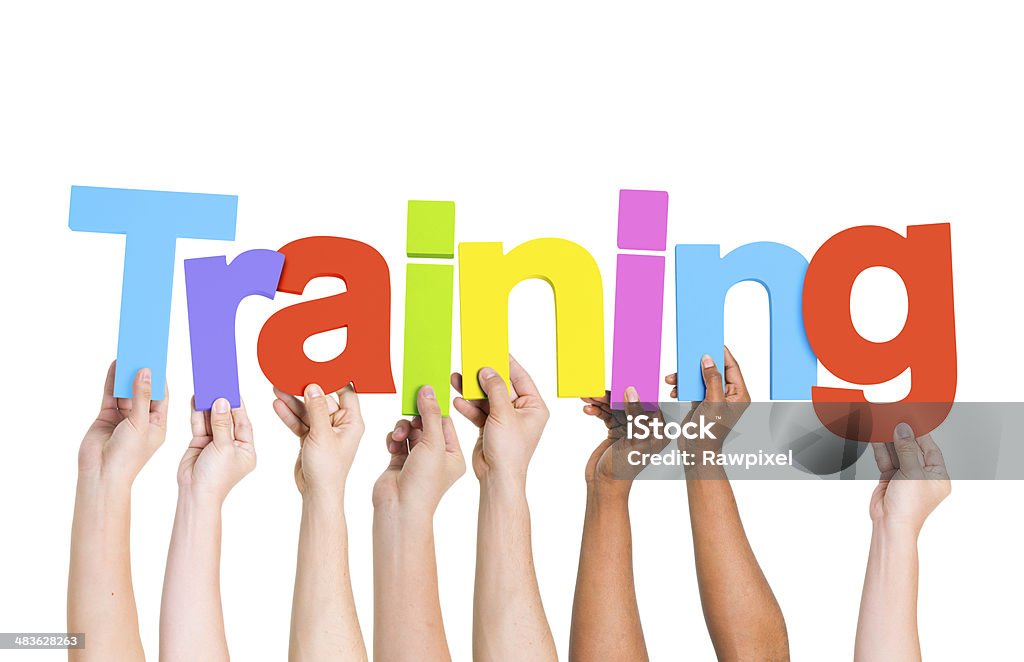 Multi-Ethnic Hands Holding Colorful Letters To Form Training  Sports Training Stock Photo