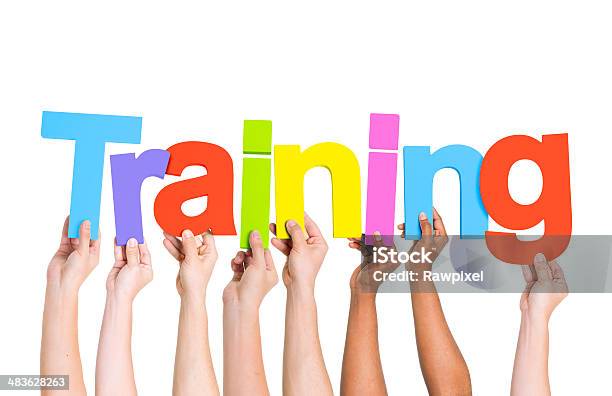 Multiethnic Hands Holding Colorful Letters To Form Training Stock Photo - Download Image Now