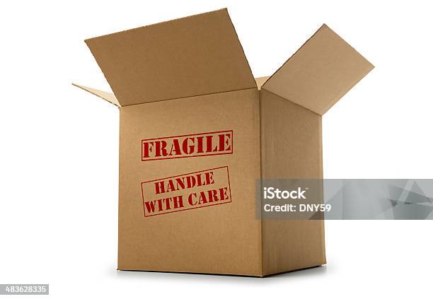 Box Labeled Fragile And Handle With Care On White Background Stock Photo - Download Image Now