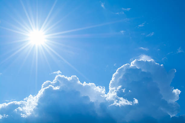 istock Sun rays against a blue sky in the clouds 483628612