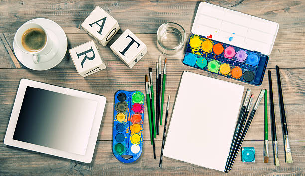 istock Artistic workplace mock up with painting tools and accessories 483629432