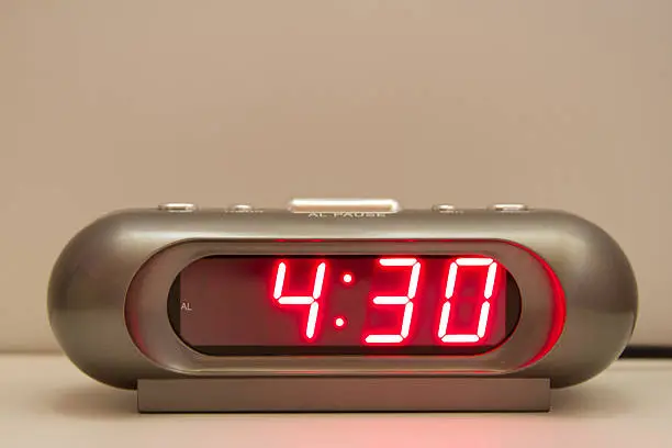 Electronic clock with red illumination