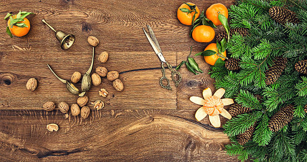 istock Orange mandarins, walnuts and antique accessories. Christmas tree branches 483630800