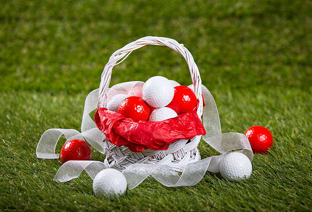 Easter Basket with Golf Balls and Ribbon stock photo