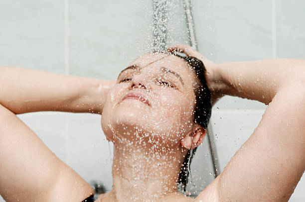 istock woman in the shower 483633563