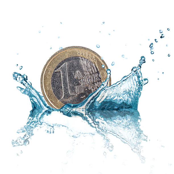 istock Euro coin with water splash. 483635174