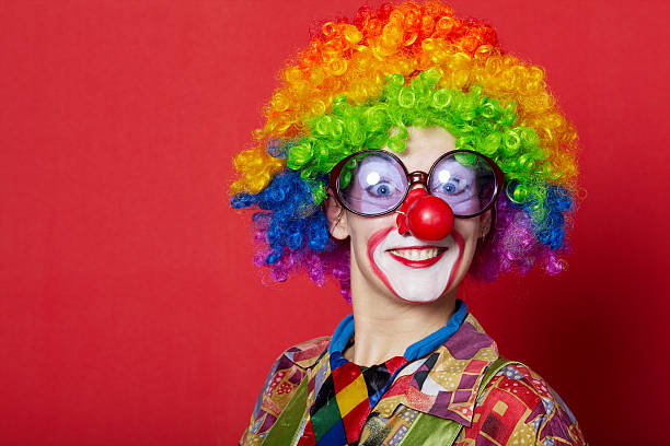 istock funny clown with glasses on red 483635876