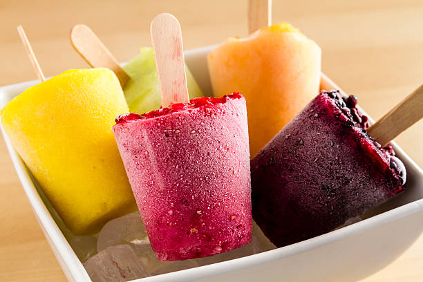 istock Homemade Fresh Pureed Fruit Frozen Popsicles 483635972