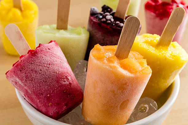 istock Homemade Fresh Pureed Fruit Frozen Popsicles 483635986