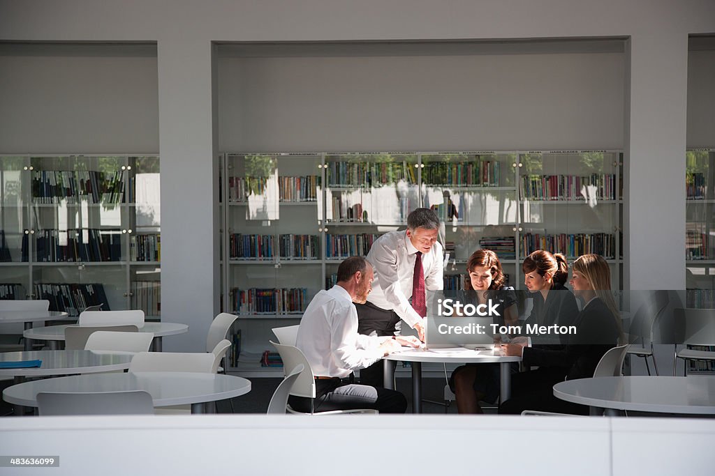 Businesspeople working in conference room  Library Stock Photo