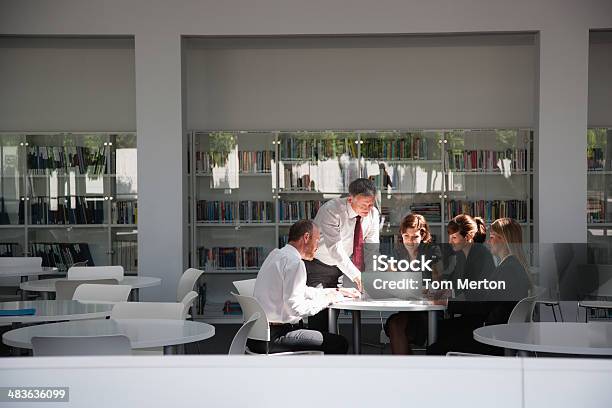 Businesspeople Working In Conference Room Stock Photo - Download Image Now - Library, Corporate Business, Board Room