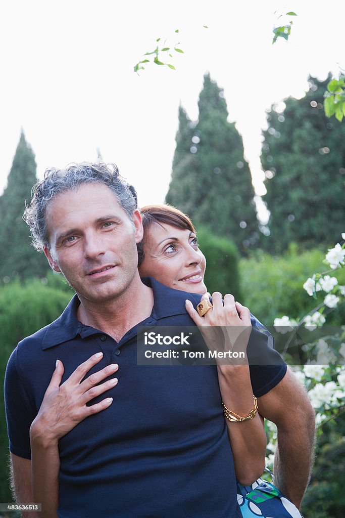 Couple hugging outdoors  50-59 Years Stock Photo