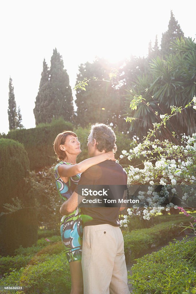 Couple hugging outdoors  40-44 Years Stock Photo