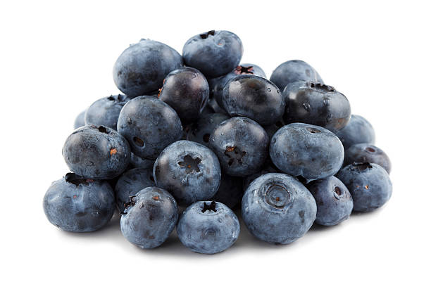 Pile of blueberries against a white background