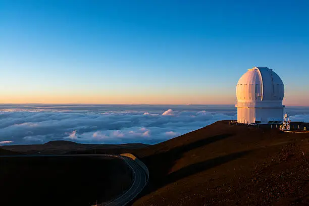 Keck observatory on Mauna Kea, at 14,000 feet, on the big island of Hawaii during sunset.