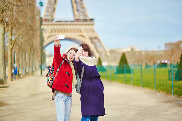 istock Two cheerful girls in Paris 483644008