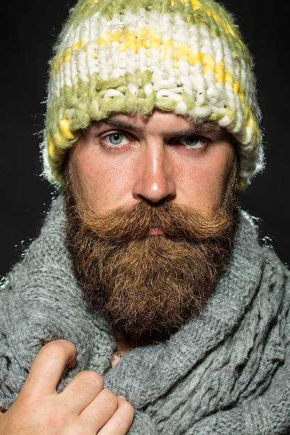 istock Portrait of sullen tramp man 483644058