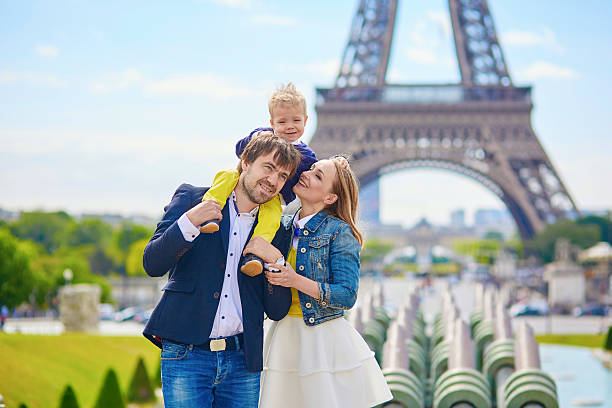 istock Happy family of three in Paris 483648302