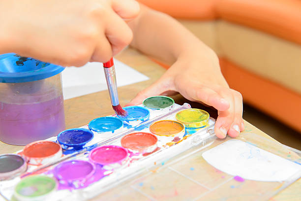 istock Little Girl Painting 483654766